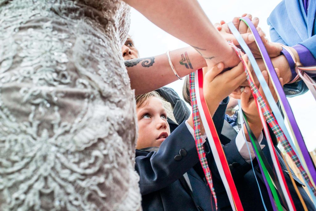 Emotional ceremony during same sex wedding