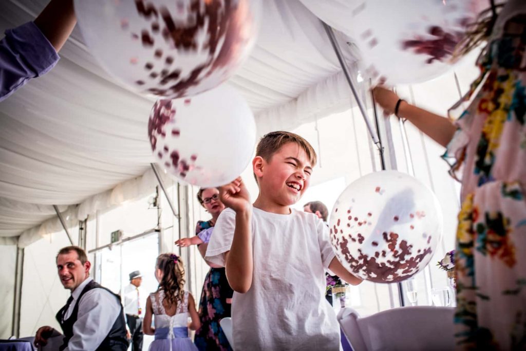 Kids playing with balloons