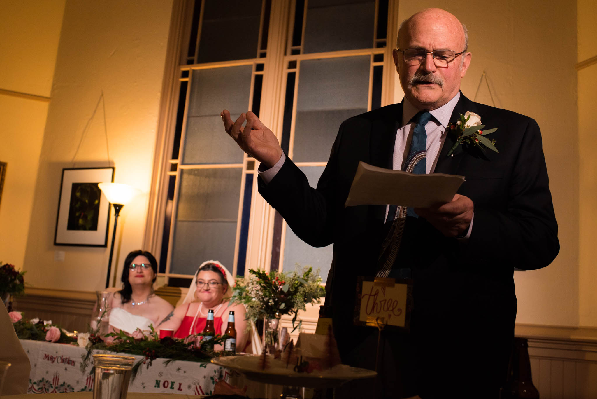 Father of the bride giving a toast during wedding reception