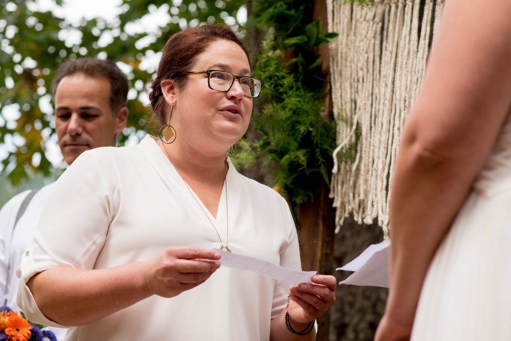 Bride reading her wedding vows in Oregon