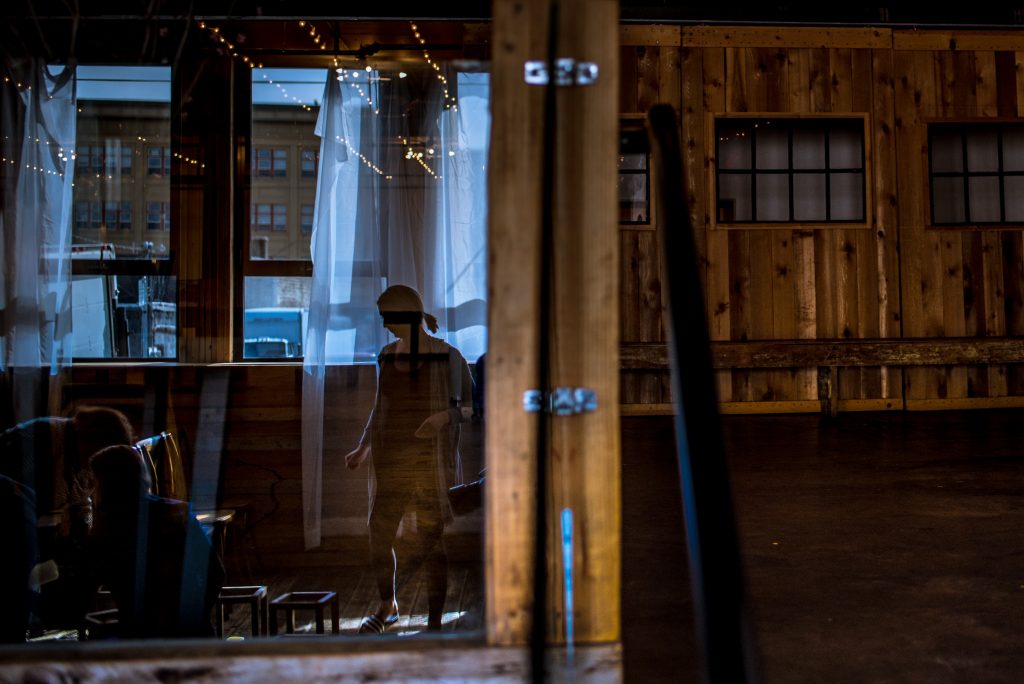 Reflections in the glass inside of the Union Pine wedding space