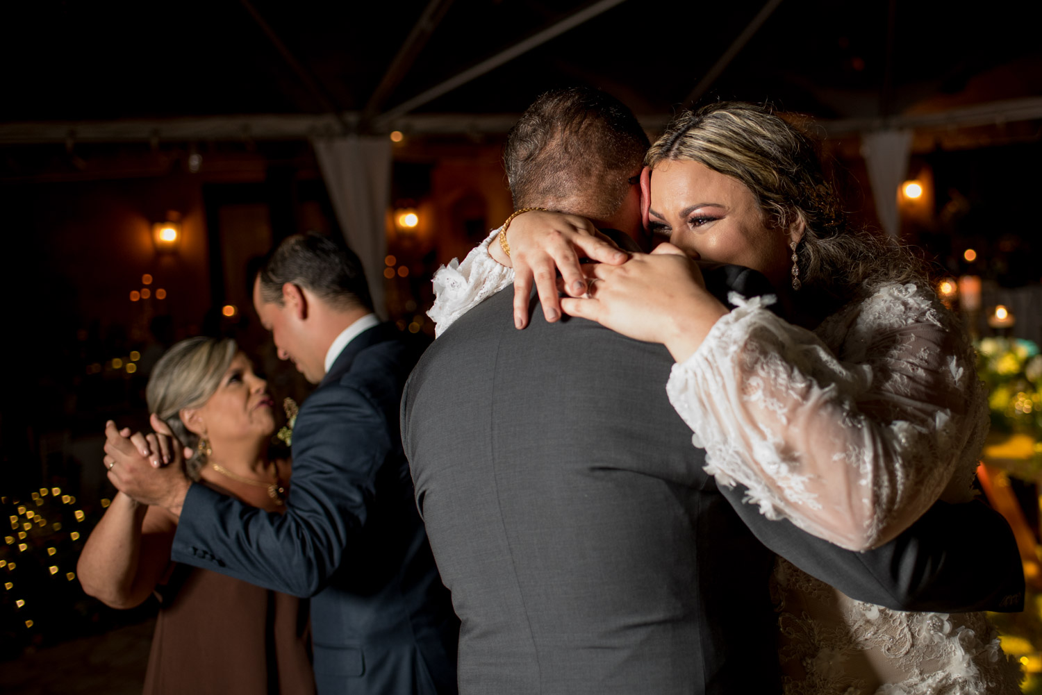 Father daughter and mother son dances during wedding reception