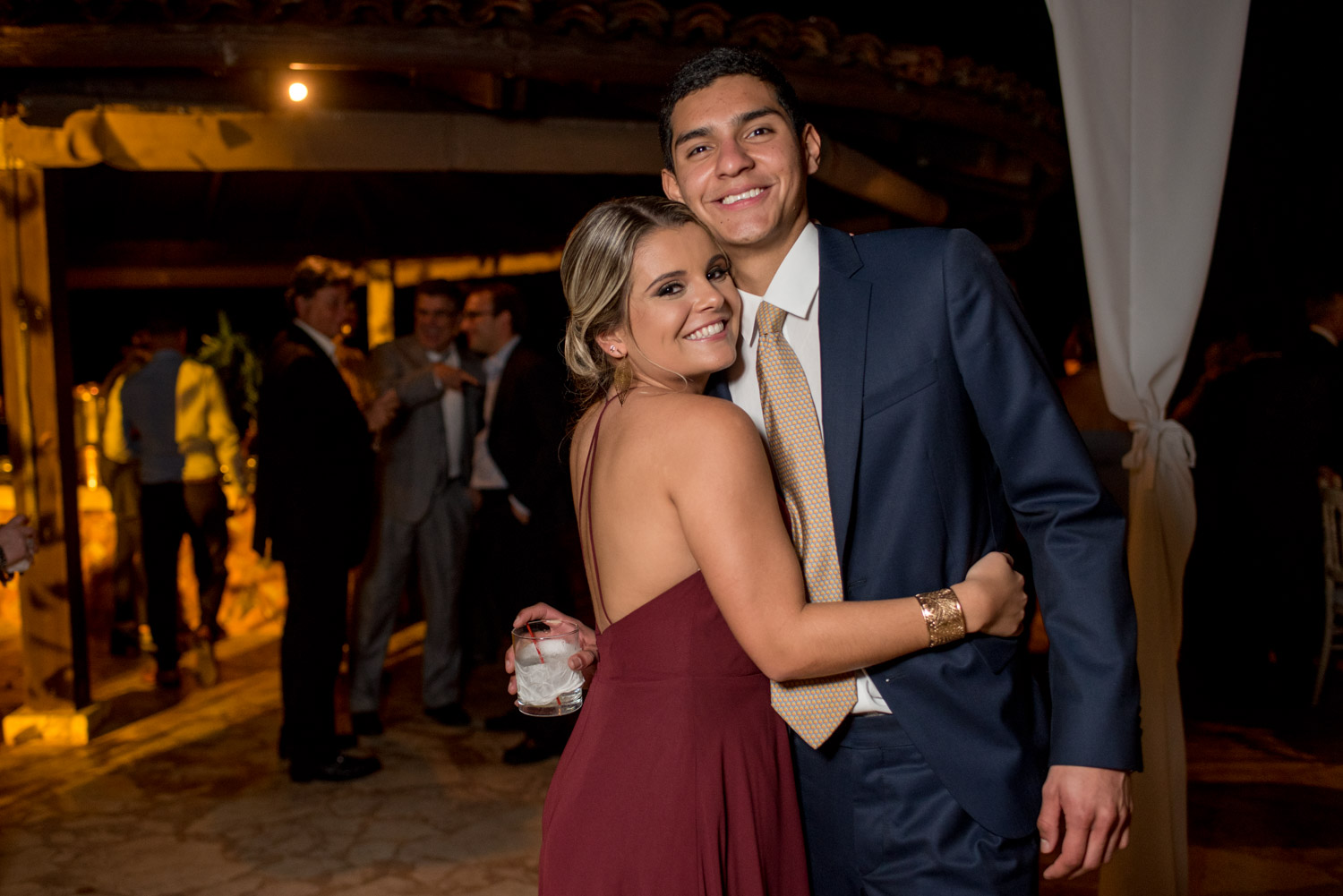 Couple smiling lit with off camera flash