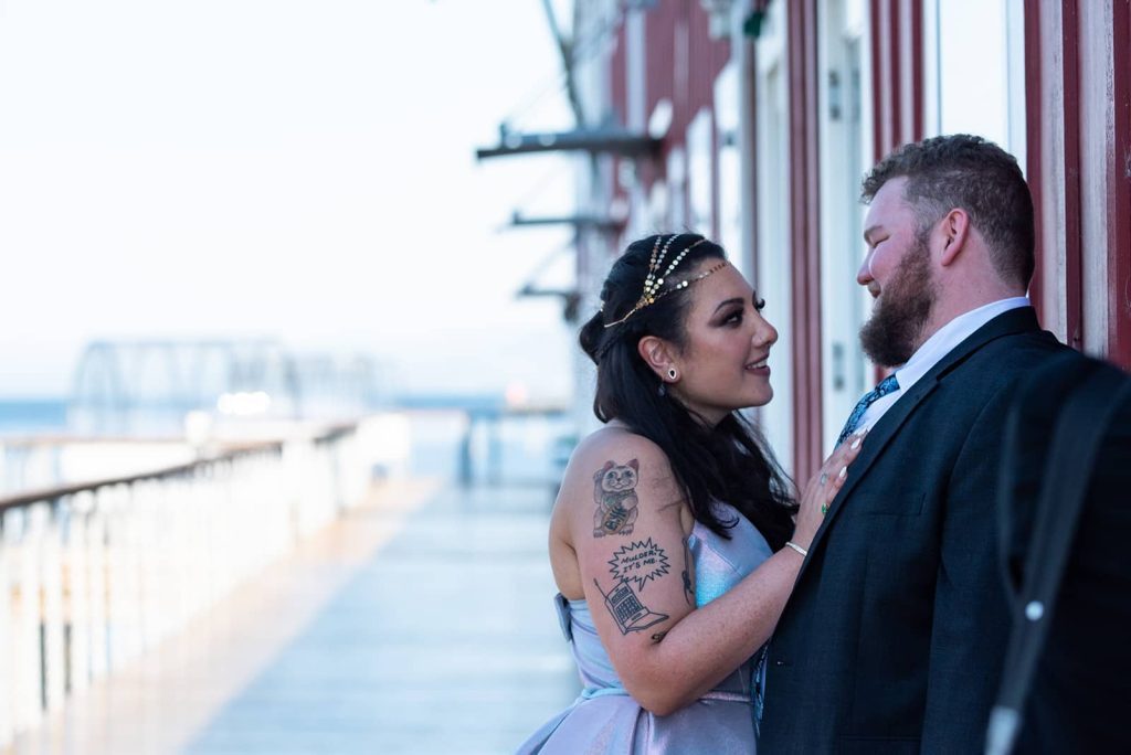 Happy bride and groom gazing into each other's eyes on their wedding day at The Loft at The Red Building.