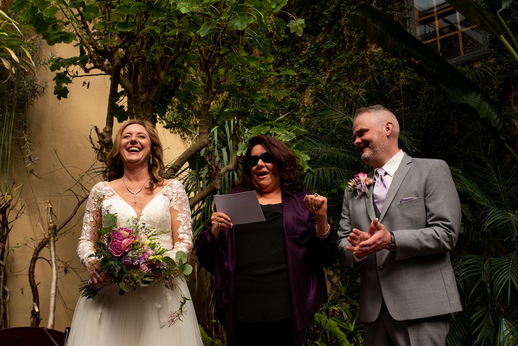 a couple of people standing next to each other.