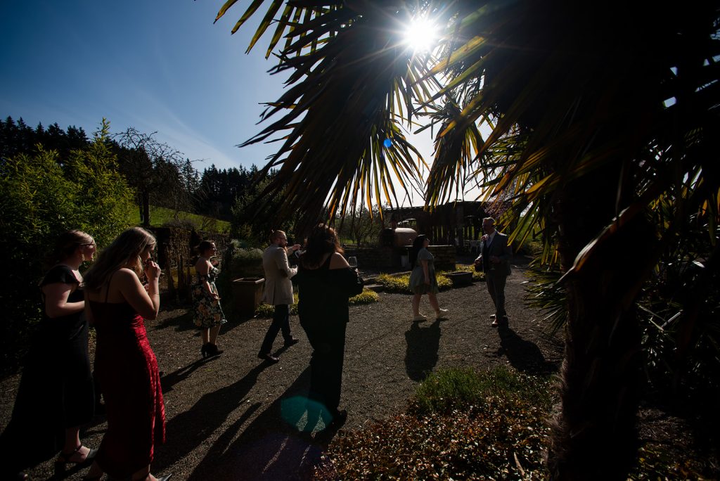 a group of people standing around each other.