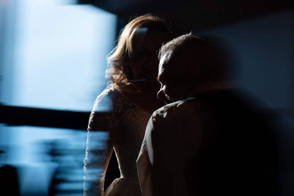 a man and a woman standing next to each other.