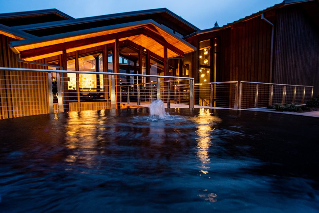 Amaterra Winery fountain with a pool of water in front of it.