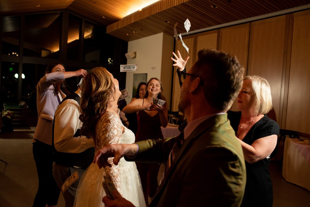 a bride and groom dancing at their wedding reception.