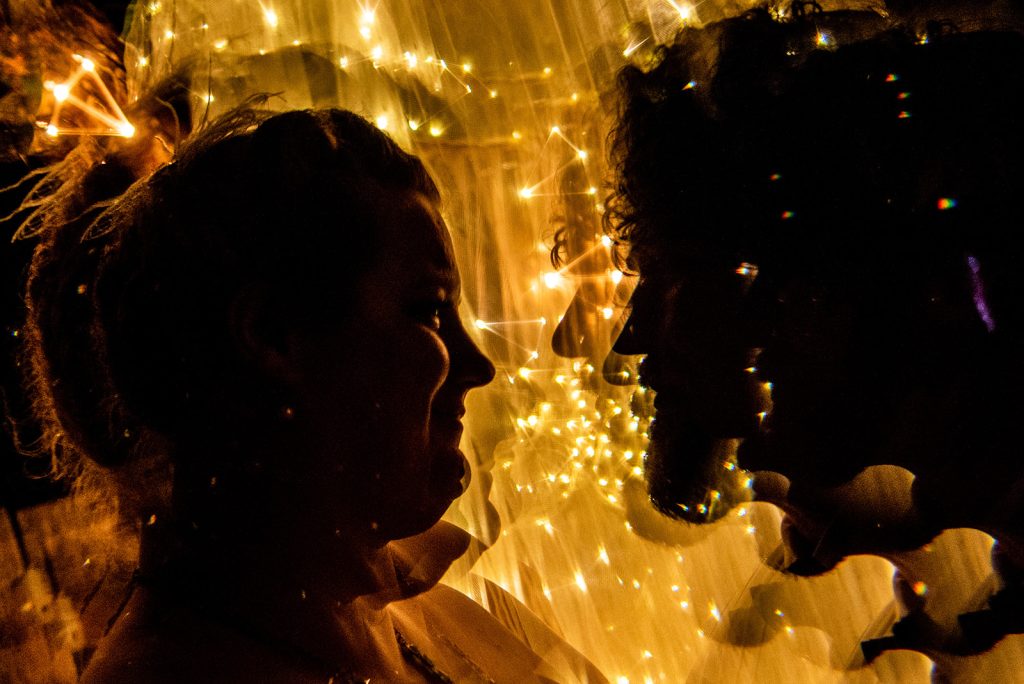 Filtered wedding photo highlighting the couple's radiant happiness.