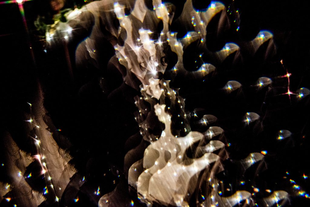 Photographic filter adding a warm and romantic feel to the couple's night wedding